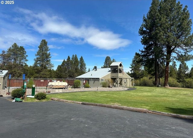 view of property exterior featuring a yard