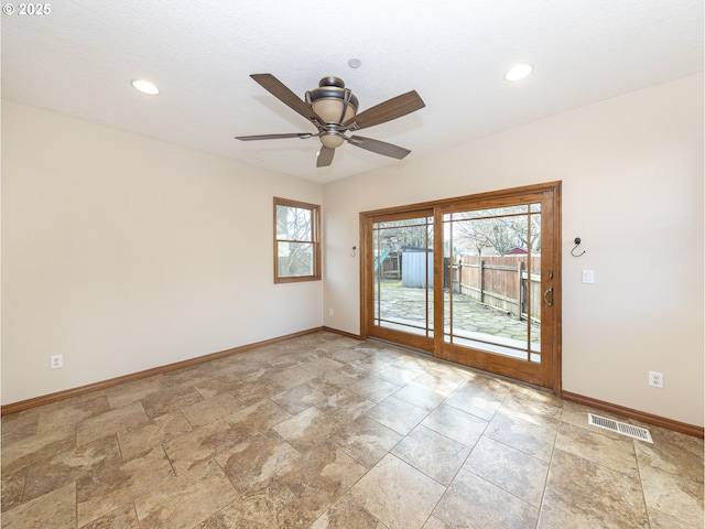1616 Primrose Ln, Forest Grove, OR 97116 - unfurnished room featuring baseboards, ceiling fan, light stone finish flooring, and recessed lighting