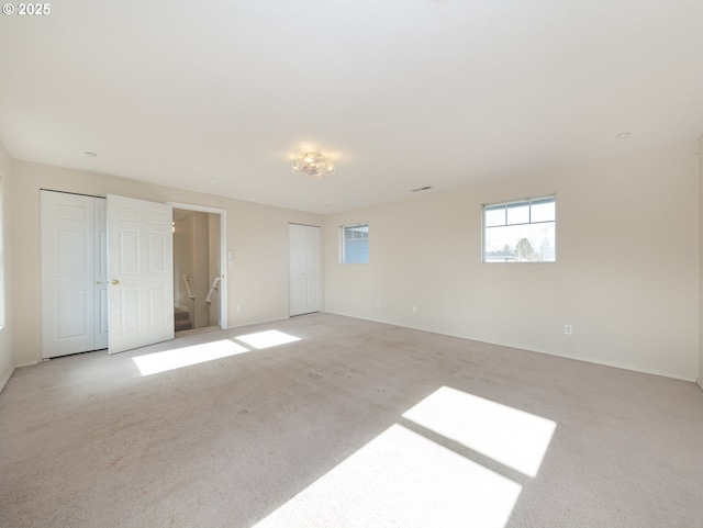 1616 Primrose Ln, Forest Grove, OR 97116 - unfurnished room featuring light colored carpet and baseboards