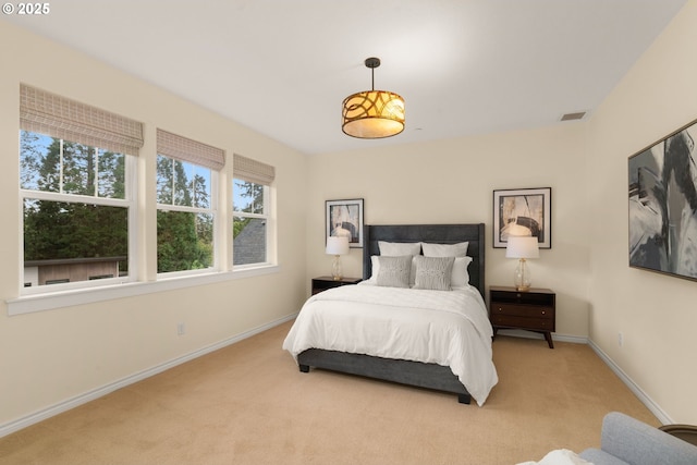 3184 SW 73rd Ave, Portland, OR 97225 - carpeted bedroom with multiple windows, visible vents, and baseboards