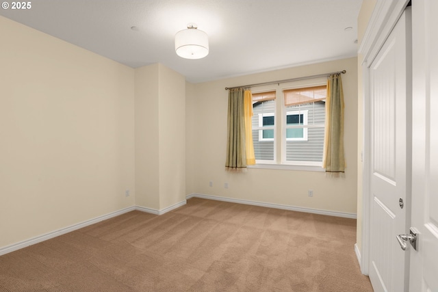3184 SW 73rd Ave, Portland, OR 97225 - empty room with baseboards and light carpet