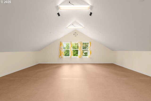 3184 SW 73rd Ave, Portland, OR 97225 - bonus room with baseboards, light carpet, visible vents, and vaulted ceiling