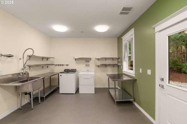 3184 SW 73rd Ave, Portland, OR 97225 - laundry area featuring washing machine and clothes dryer, baseboards, laundry area, and visible vents