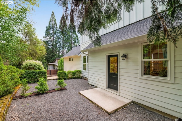 3184 SW 73rd Ave, Portland, OR 97225 - exterior space with roof with shingles, fence, a patio, and board and batten siding
