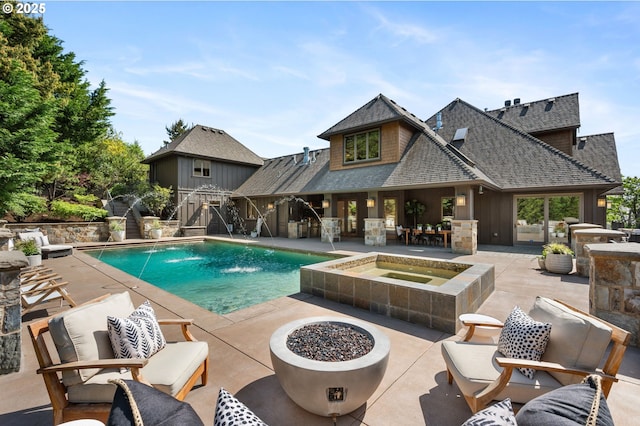 7927 NW Hawkins Blvd, Portland, OR 97229 - view of swimming pool featuring a patio area and an in-ground hot tub