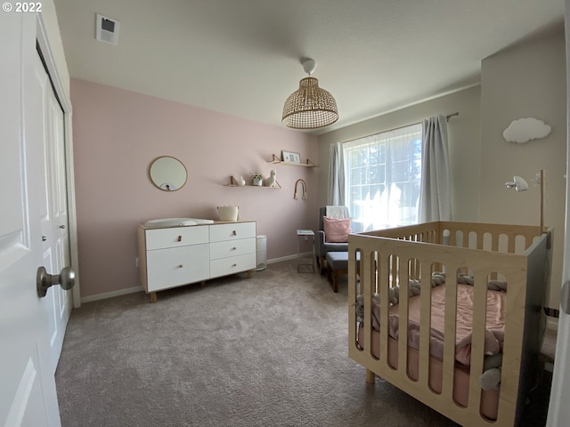 9537 SW 171st Ave, Beaverton, OR 97007 - bedroom with carpet, a nursery area, a closet, and baseboards