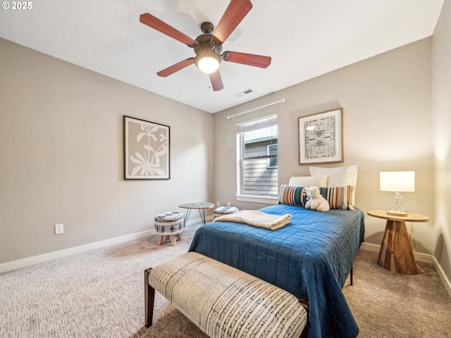 bedroom with visible vents, a ceiling fan, carpet, and baseboards