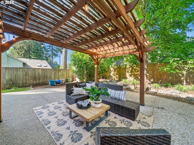 view of patio featuring a pergola, an outdoor living space, and a fenced backyard