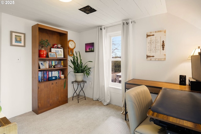 office space with carpet floors and lofted ceiling