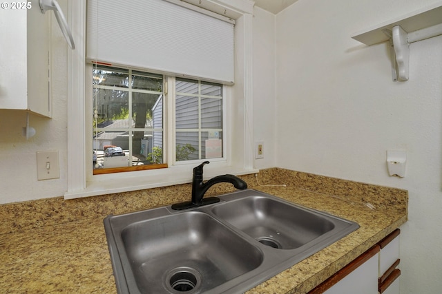 4001 12th St Cut Off SE Unit 18, Salem, OR 97302 - kitchen view of a sink, light countertops, and white cabinetry
