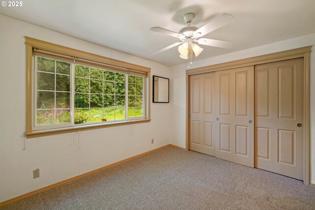 4001 12th St Cut Off SE Unit 18, Salem, OR 97302 - unfurnished bedroom with carpet floors, baseboards, a closet, and ceiling fan