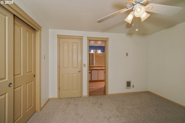 4001 12th St Cut Off SE Unit 18, Salem, OR 97302 - unfurnished bedroom with light colored carpet, baseboards, ensuite bath, and ceiling fan