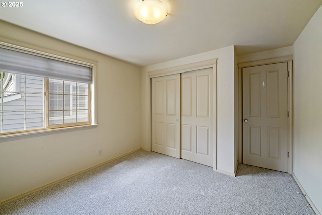 4001 12th St Cut Off SE Unit 18, Salem, OR 97302 - unfurnished bedroom with carpet floors, a closet, and baseboards