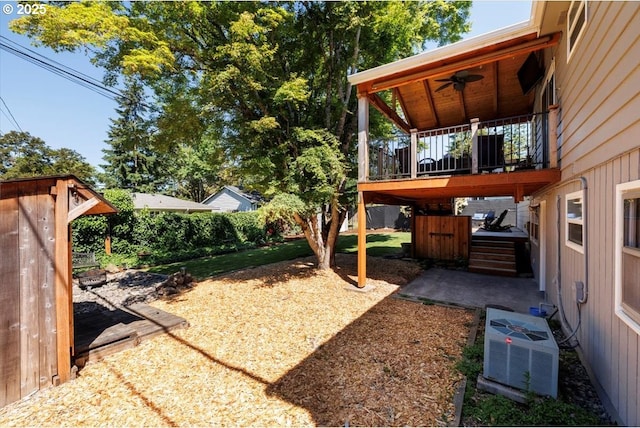 1375 NW Murray Rd, Portland, OR 97229 - view of yard with a ceiling fan and central air condition unit