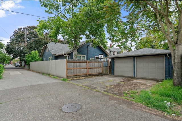 165 15th St, Salem, OR 97301 - view of side of property with a garage and an outdoor structure