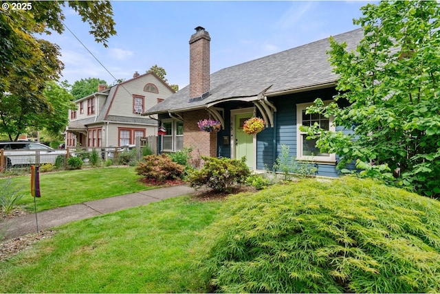 165 15th St, Salem, OR 97301 - view of front of property with a chimney, roof with shingles, and brick siding
