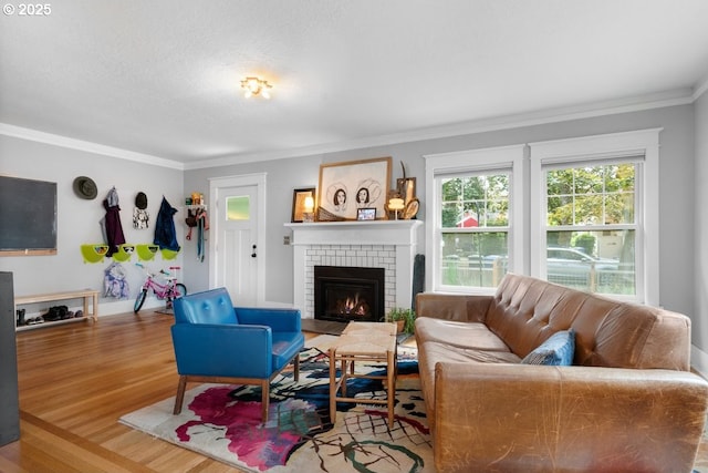 165 15th St, Salem, OR 97301 - living area featuring crown molding, a brick fireplace, and wood finished floors