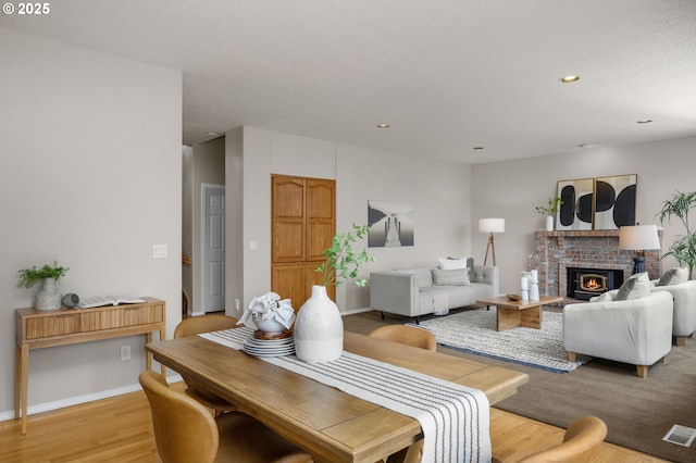 4025 Horton Rd, West Linn, OR 97068 - living room featuring light wood-style flooring, recessed lighting, and a fireplace