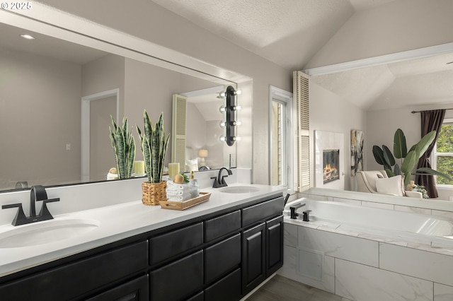 4025 Horton Rd, West Linn, OR 97068 - bathroom featuring vaulted ceiling, double vanity, and a garden tub