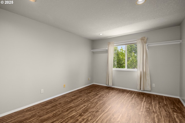 4025 Horton Rd, West Linn, OR 97068 - unfurnished room with dark wood-type flooring, recessed lighting, and a textured ceiling