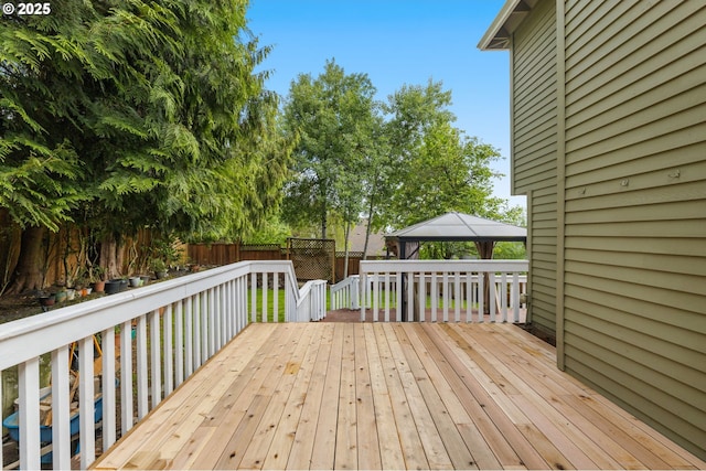 4025 Horton Rd, West Linn, OR 97068 - wooden deck featuring a gazebo and a fenced backyard