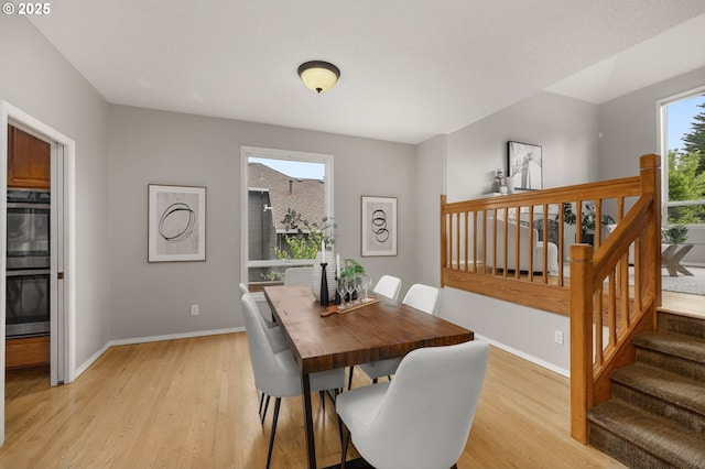 4025 Horton Rd, West Linn, OR 97068 - dining space with light wood finished floors and stairway