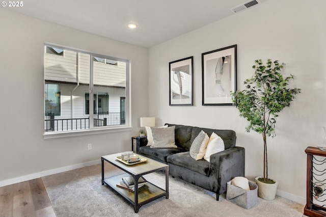 1669 SE Sherrett St, Portland, OR 97202 - living room featuring recessed lighting and wood finished floors