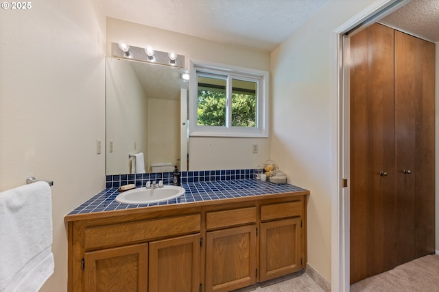 4300 Botticelli St, Lake Oswego, OR 97035 - bathroom with vanity and a textured ceiling