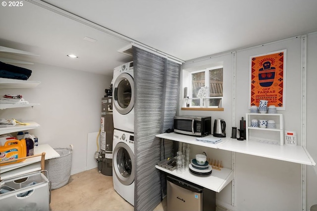 4541 NE 36th Ave, Portland, OR 97211 - washroom with stacked washer / dryer and water heater