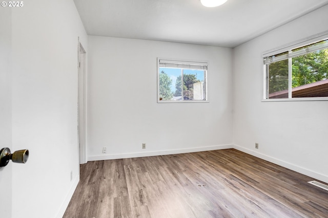 2210 Winter St SE, Salem, OR 97302 - spare room featuring wood finished floors