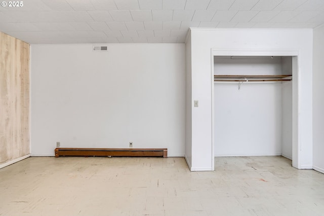 2210 Winter St SE, Salem, OR 97302 - unfurnished bedroom featuring baseboard heating and a closet