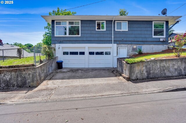 2210 Winter St SE, Salem, OR 97302 - view of front of home featuring driveway and an attached garage