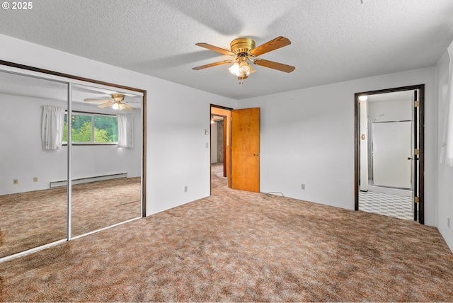 1223 Sable Dr, Roseburg, OR 97470 - unfurnished bedroom with a baseboard radiator, carpet floors, a textured ceiling, a closet, and a ceiling fan