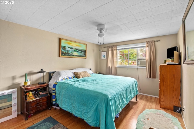 730 23rd St, Springfield, OR 97477 - bedroom featuring wood finished floors, a ceiling fan, and cooling unit