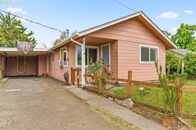 730 23rd St, Springfield, OR 97477 - view of front of house with asphalt driveway and a carport