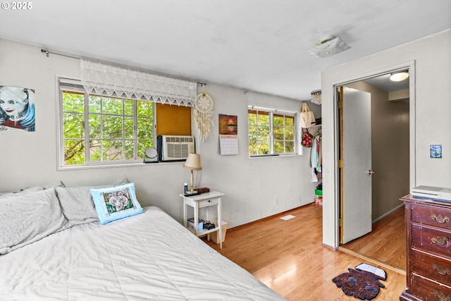 730 23rd St, Springfield, OR 97477 - bedroom featuring wood finished floors and cooling unit