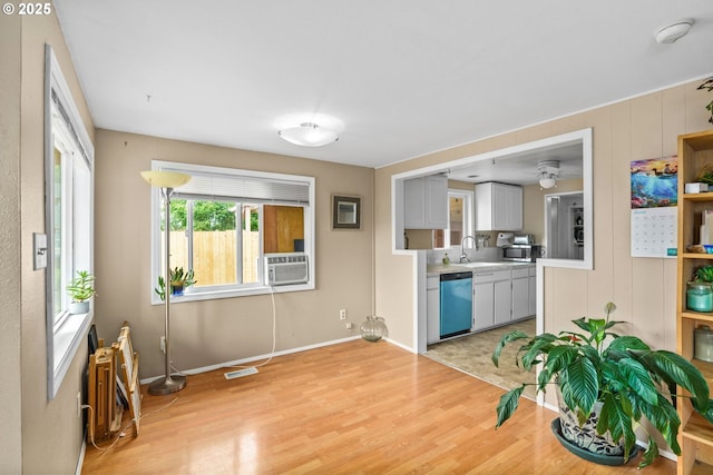 730 23rd St, Springfield, OR 97477 - kitchen with dishwasher, cooling unit, light wood-style floors, and light countertops