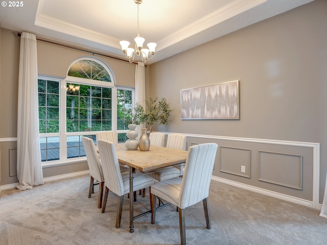 1354 Skye Pkwy, West Linn, OR 97068 - carpeted dining room featuring crown molding, a raised ceiling, and a chandelier