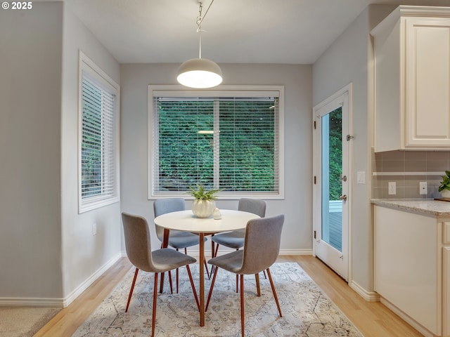 1354 Skye Pkwy, West Linn, OR 97068 - dining room featuring light wood-type flooring and baseboards