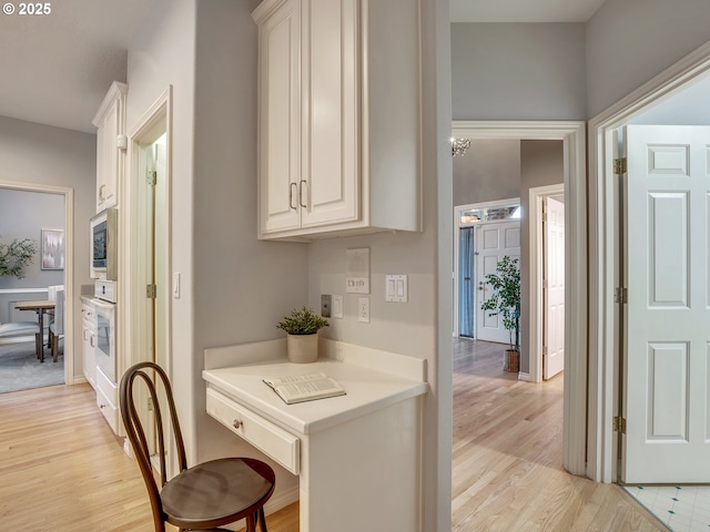 1354 Skye Pkwy, West Linn, OR 97068 - corridor featuring light wood-style flooring and baseboards