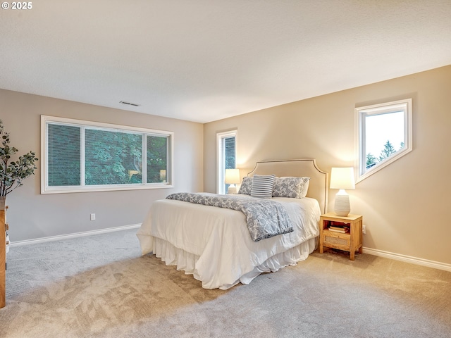 1354 Skye Pkwy, West Linn, OR 97068 - bedroom with carpet flooring, multiple windows, and baseboards
