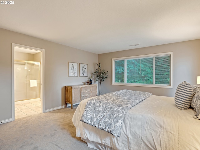 1354 Skye Pkwy, West Linn, OR 97068 - bedroom featuring light colored carpet, baseboards, and ensuite bathroom