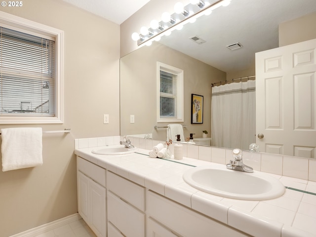 1354 Skye Pkwy, West Linn, OR 97068 - full bathroom with double vanity and baseboards