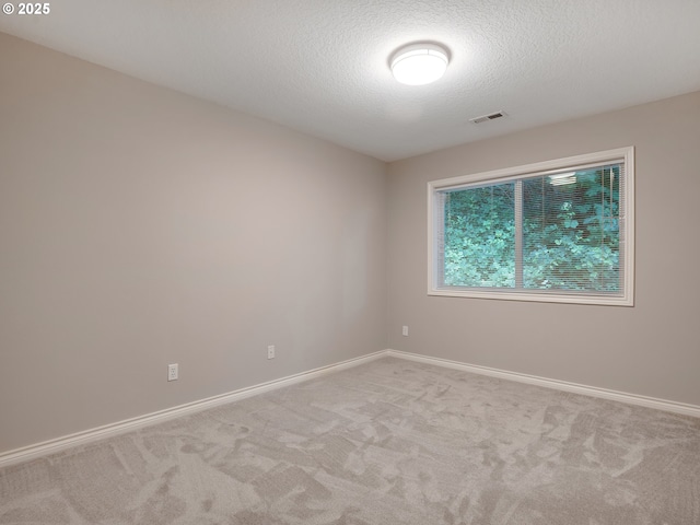 1354 Skye Pkwy, West Linn, OR 97068 - empty room featuring carpet floors, baseboards, and a textured ceiling