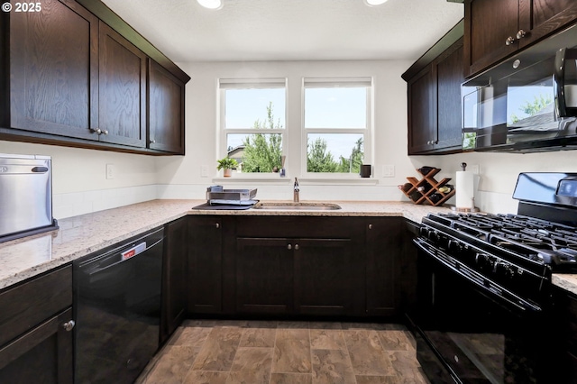 2057 S 59th St, Springfield, OR 97478 - kitchen with black appliances, dark brown cabinetry, light stone countertops, and recessed lighting