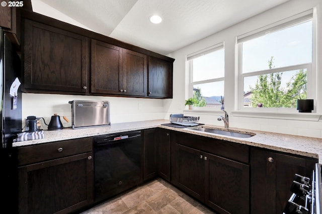 2057 S 59th St, Springfield, OR 97478 - kitchen featuring black appliances, dark brown cabinets, light stone counters, light stone finish floors, and recessed lighting