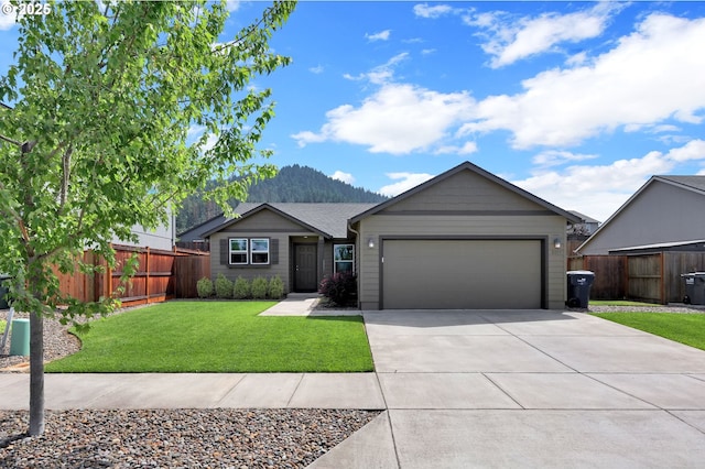 2057 S 59th St, Springfield, OR 97478 - single story home featuring driveway, an attached garage, and a mountain view