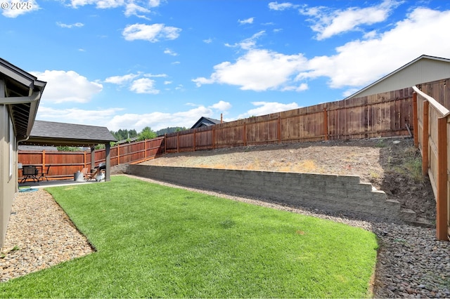 2057 S 59th St, Springfield, OR 97478 - fenced backyard with a patio area
