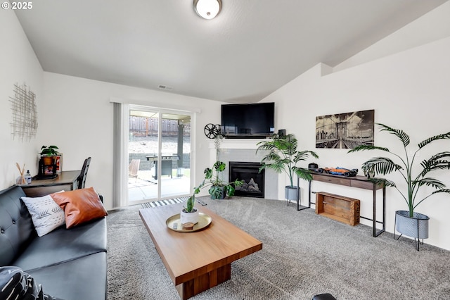 2057 S 59th St, Springfield, OR 97478 - carpeted living area featuring a fireplace and vaulted ceiling