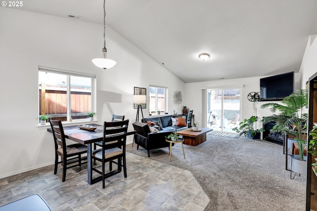 2057 S 59th St, Springfield, OR 97478 - dining area featuring high vaulted ceiling and light stone finish floors